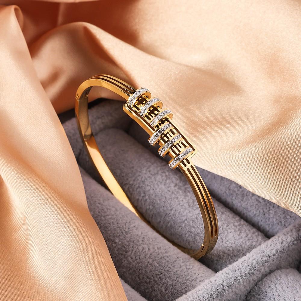 Women's Titanium Steel Luxury Bracelet with Hollow Design and Inlaid Round Diamonds
