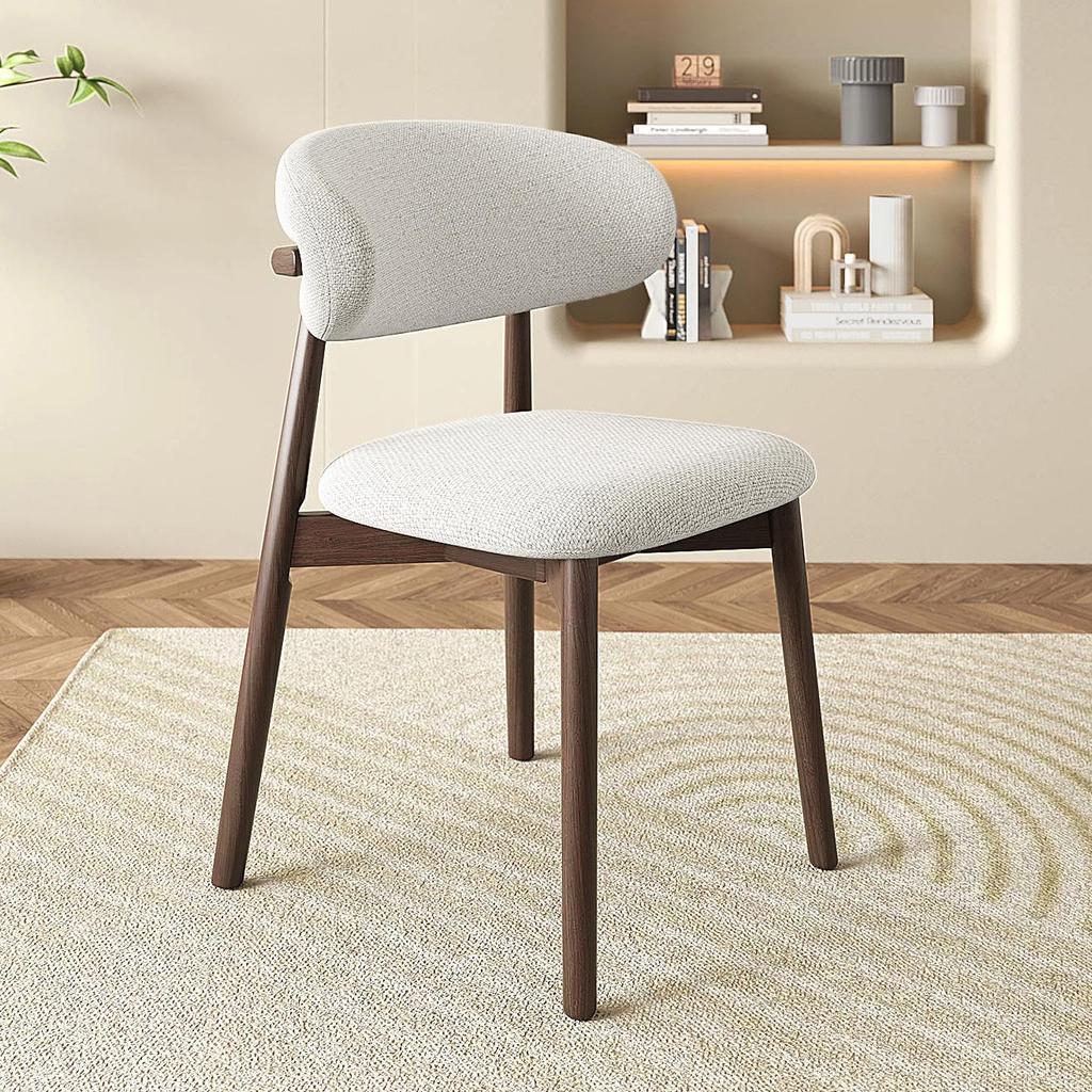 Nordic Modern Minimalist Solid Wood Dining Chair with Soft Pack Backrest - Comfortable Light Luxury Ram's Horn Design for Home, Restaurant, and Hotel.