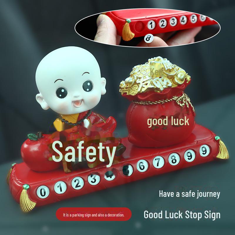Creative Little Monk Maitreya Buddha Car Ornament: Cute, Shaking Head Resin Doll for Car Interior Decoration and Safety.