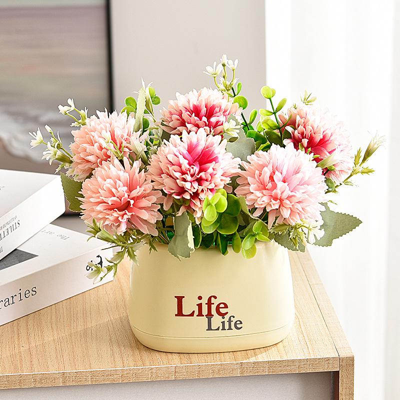 Living Room Decor: Artificial Sunflower and Green Plant Arrangements, Small Potted Plants, and Plastic Bouquets