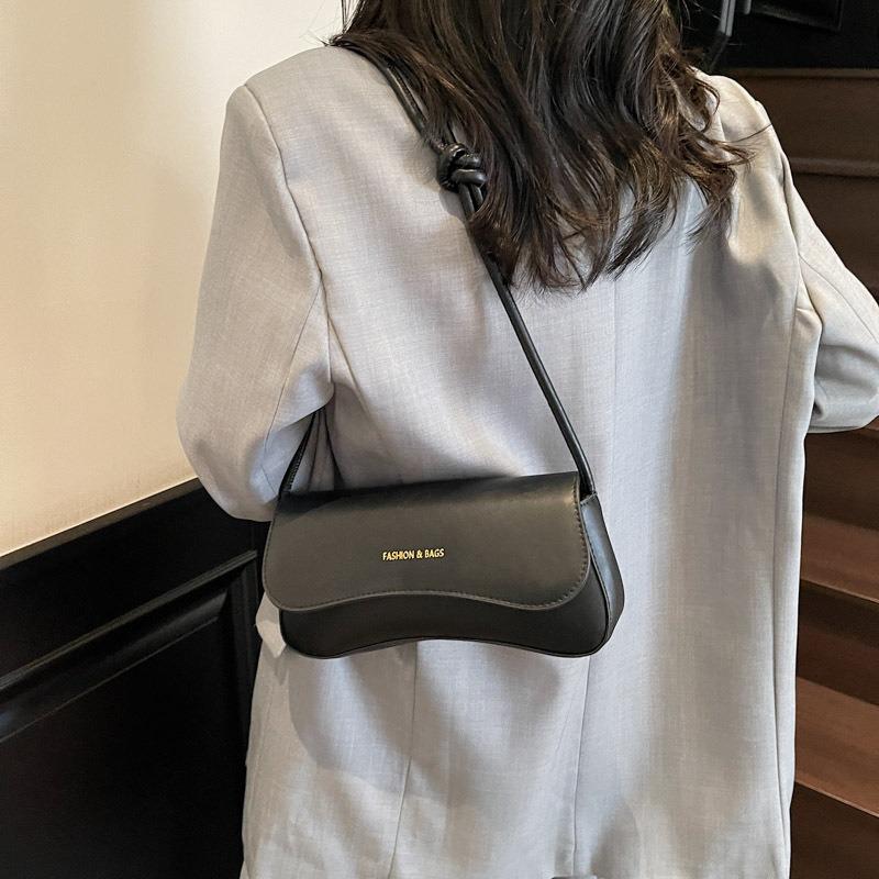 Solid color bag women's new niche design trendy brand baguette bag retro shoulder underarm bag simple small square bag