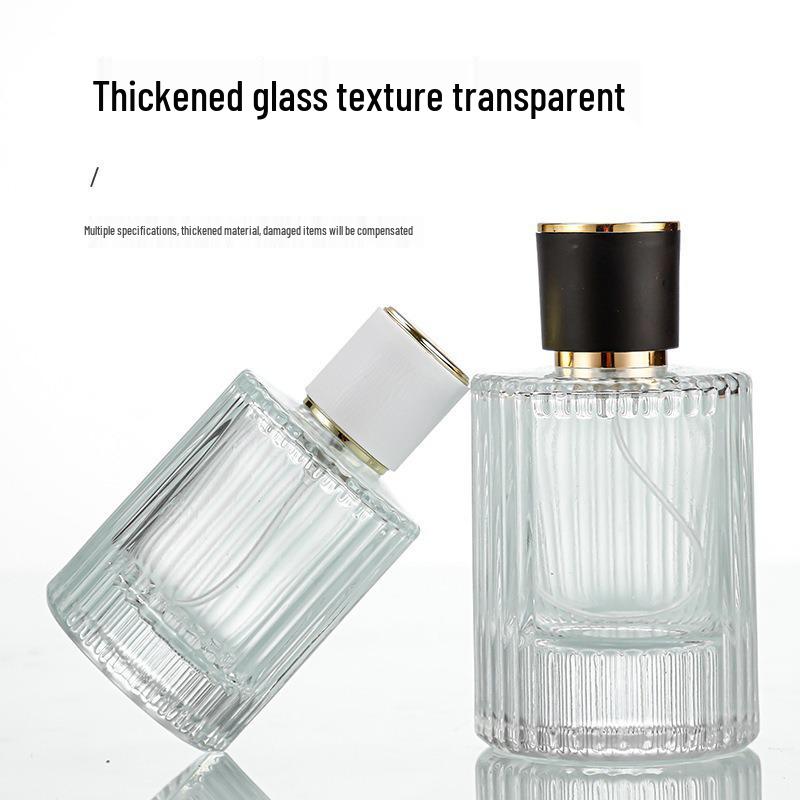 30ml Vertical Stripe Glass Perfume Spray Bottle – Portable, Transparent, and Cylindrical.