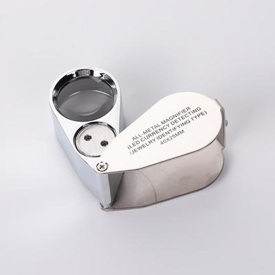 Skládací lupa 40x25mm s LED světlem pro ověřování bankovek a identifikaci šperků, Vysoce výkonná lupa