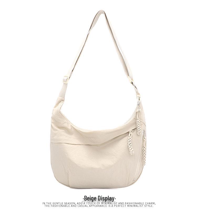 Damen 2025 High-End Wasserdichte Nylon Halbmond Umhängetasche