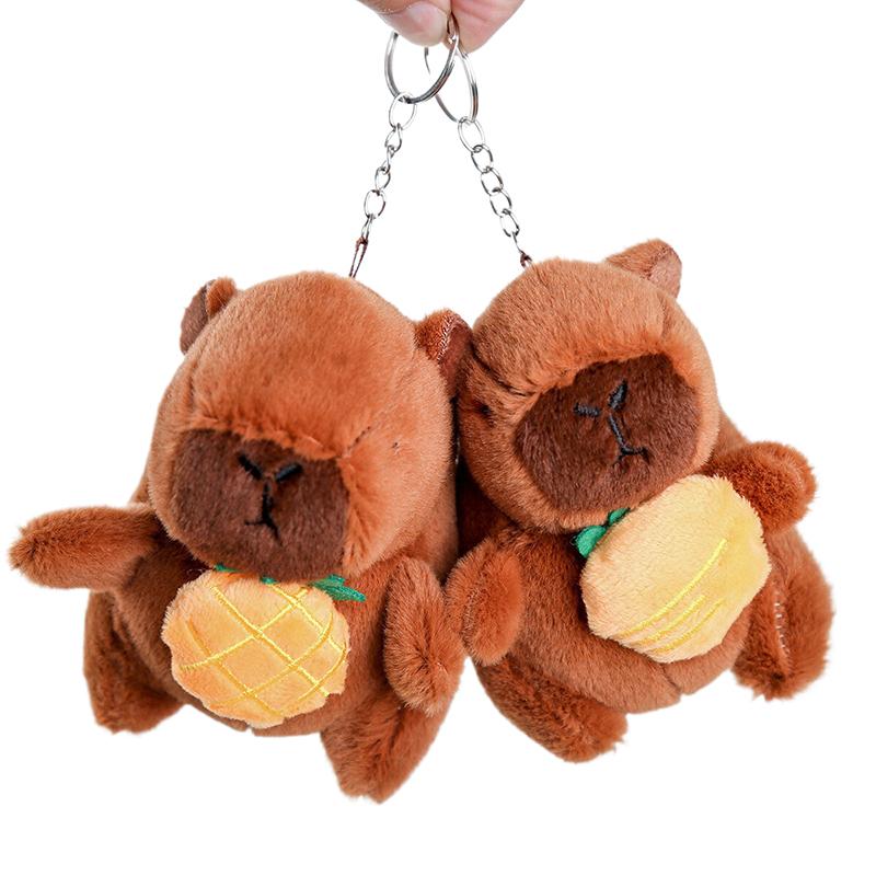 12Cm Cute Plush Capybara Holding Fruit Quick Pull Keychain Toy Cartoon Capybara Fluffty Animal Doll Plush Pendant Accessories