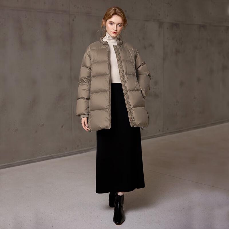 

Женский пуховик свободного кроя однотонный зимний L