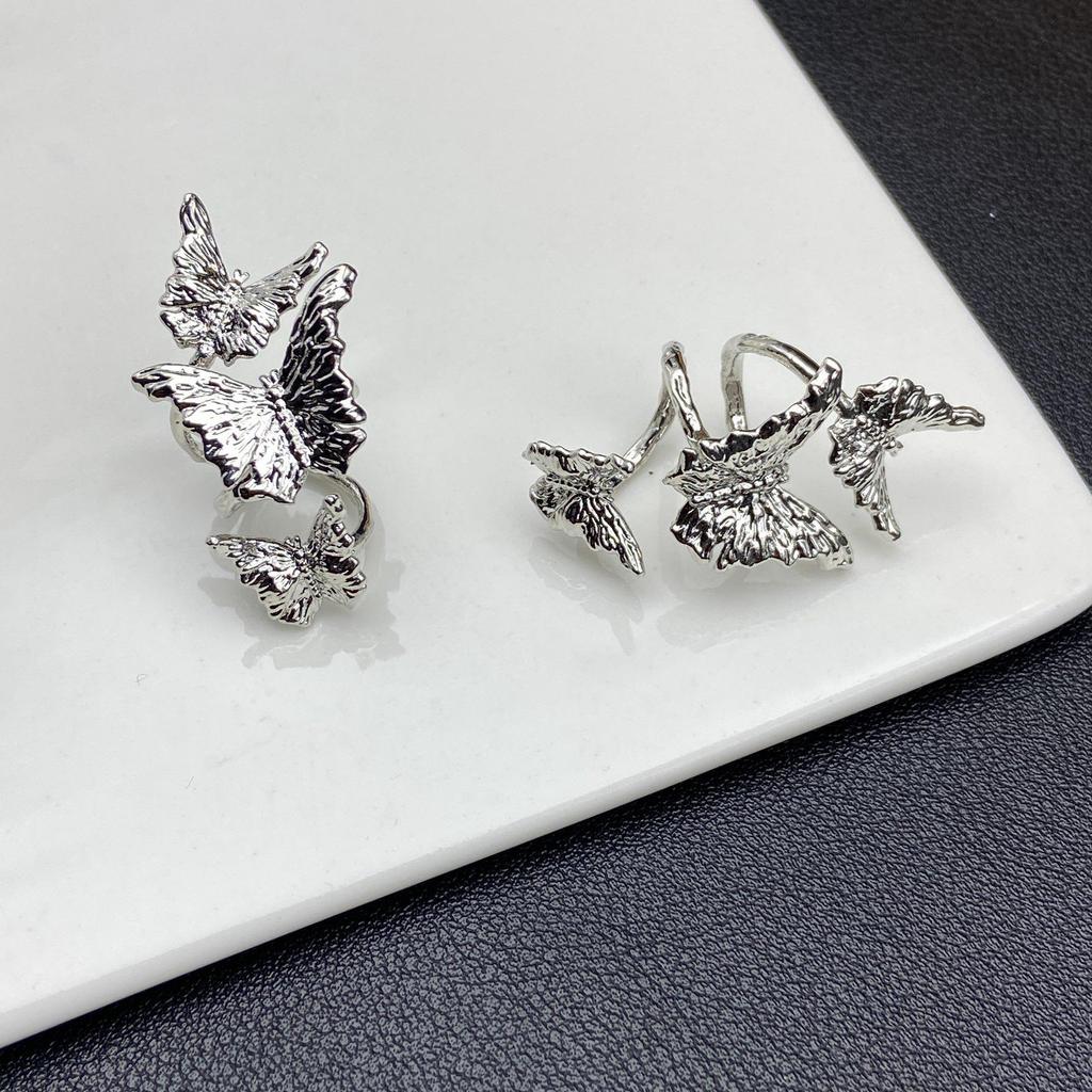 Gunmetal Schmetterling Abstandshalter Perlen: Zirkonkristall-ummantelte Perlen für DIY-Schmuck im dunklen Stil.