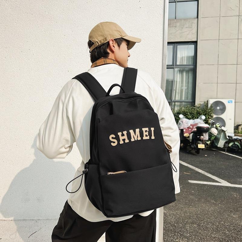 

School bag female college student junior high school backpack burden reduction backpack versatile style printing large capacity чорний