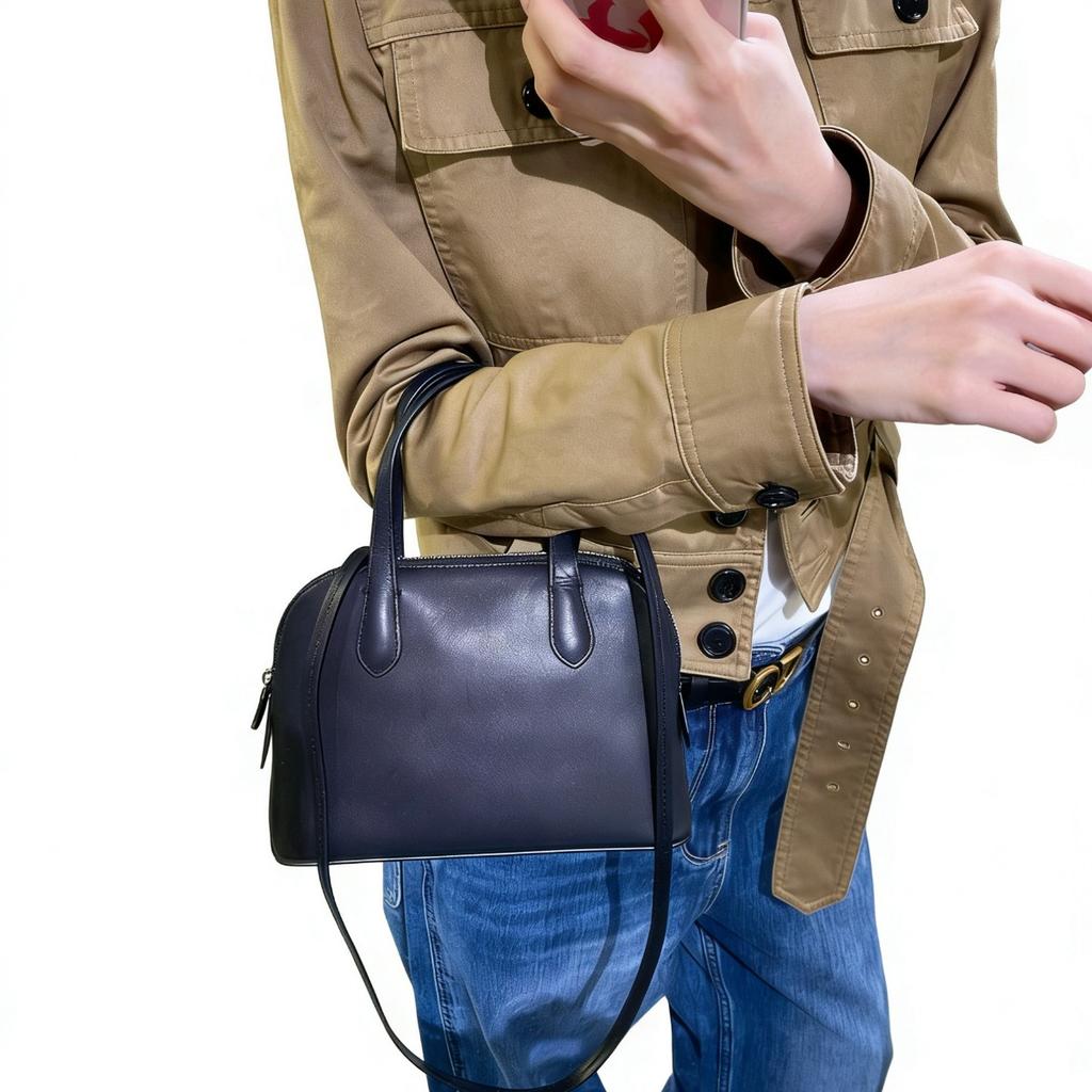 Niche first-layer cowhide minimalist 2026 new spring and summer shell bag single shoulder crossbody portable commuter bowling bag