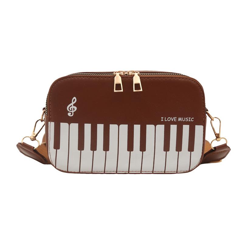 

2025 new piano bag fashionable contrasting color small square bag female sweet piano music note small satchel portable women s bag коричневый