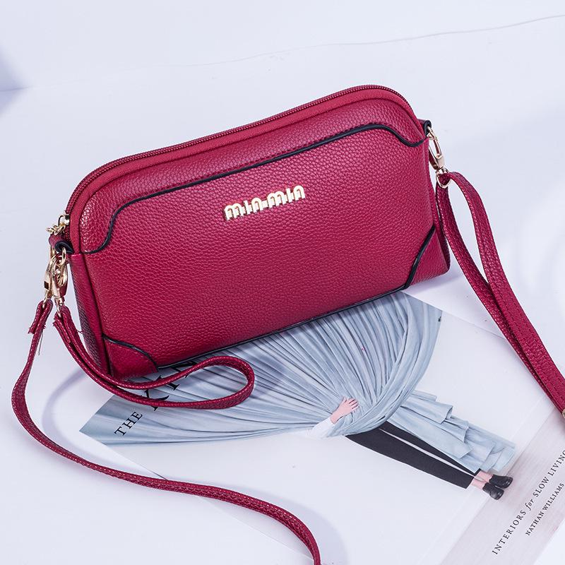 

New lychee pattern shell women s bag fashion shoulder bag oblique span small bag style clutch bag women