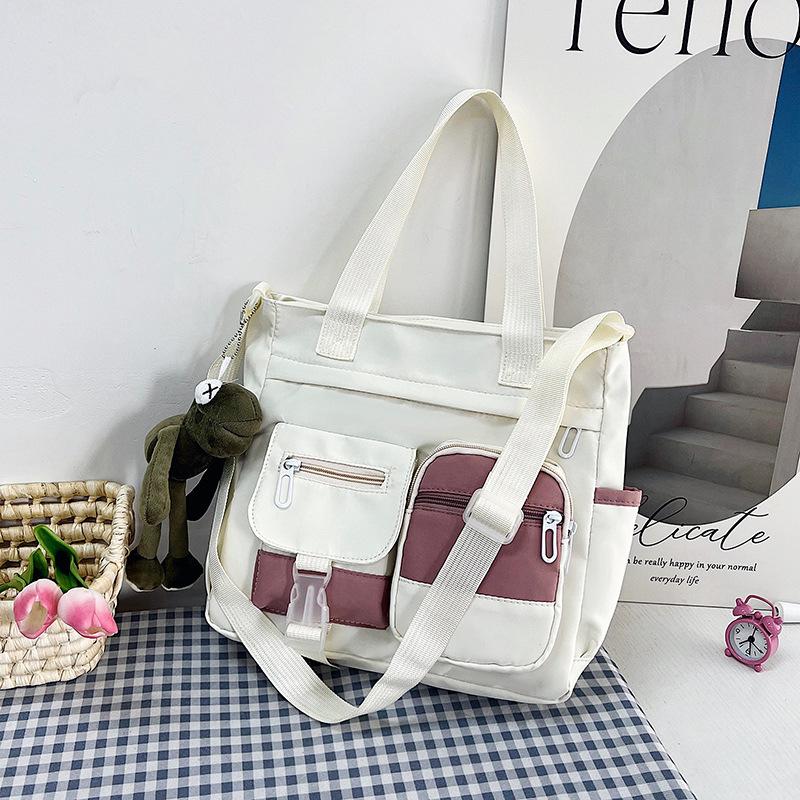 Large capacity bag female messenger ins wind Japanese college students class shoulder bag versatile literary tote bag