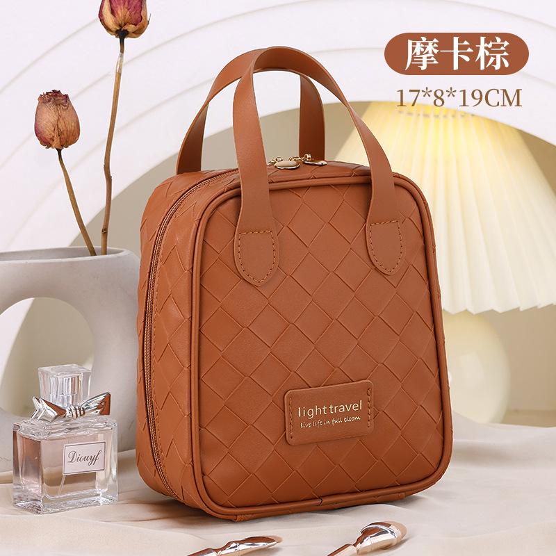 Portable travel PU storage bag Cosmetics new large-capacity woven cosmetic bag high-value storage bag