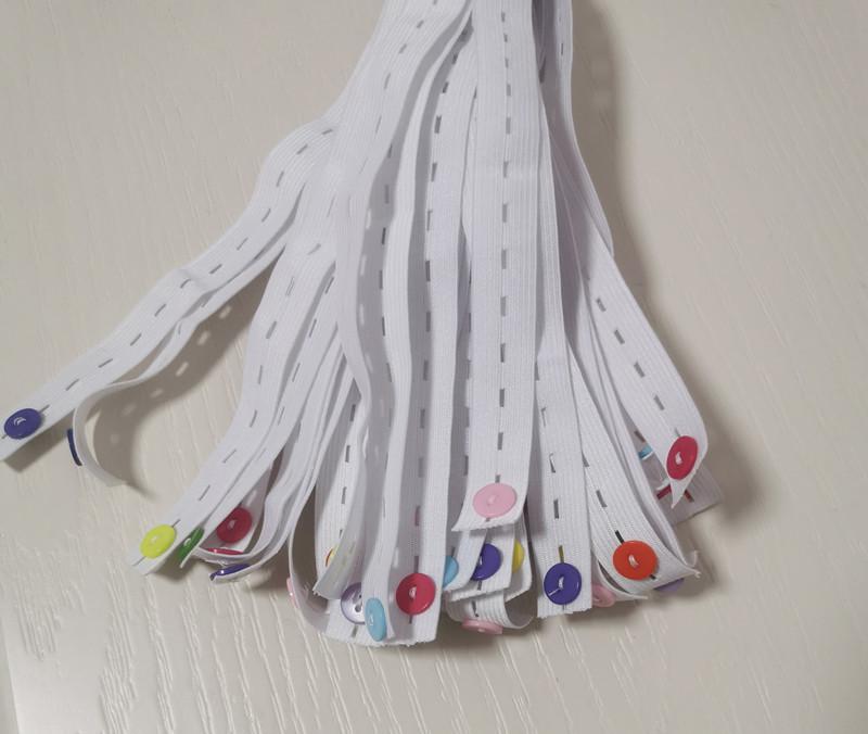 Clothes Folding and Storage Organizer: Quilt Tie Straps, Folding Board, Bundling Strap, and Pants Organizer Rope.