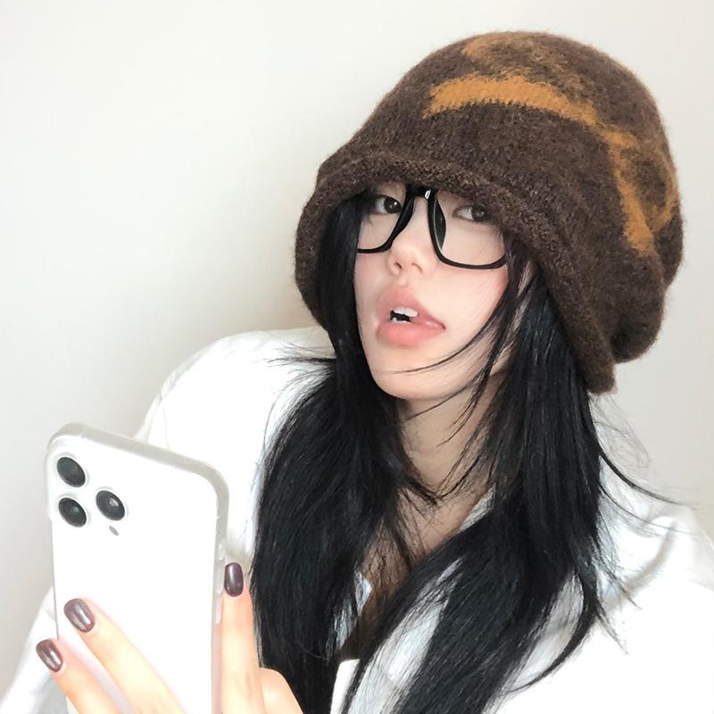 Autumn and winter cold hat women's bows piled up knitted hat autumn bag head shows small face and big head circumference