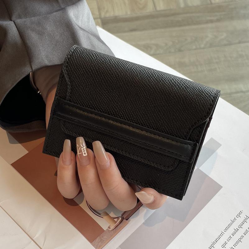 Anti-magnetic card bag, women's leather, large capacity, multi-card position, new niche design, simple, fashionable and compact mini card bag.