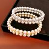Gold and Zirconia Reflective Pearl Bracelet - Exquisitely Designed, Luxurious, and Versatile Hand Jewelry
