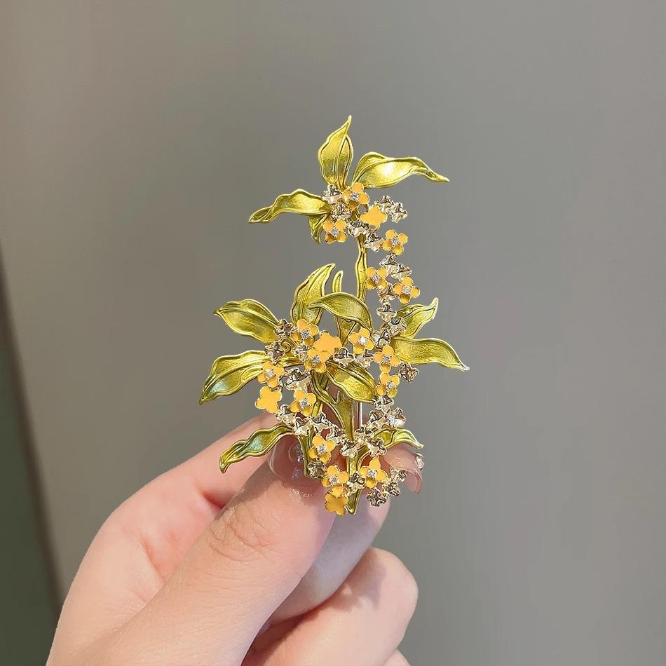 Autumn and winter new enamel dripping oil osmanthus brooch women s light luxury fashion temperament plant flower brooch