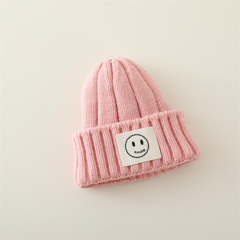 

New Solid Color Versatile Children s Hats for Infants and Young Children To Keep Warm Simple and Smiling Woolen Knitted Hats Trendy One size
