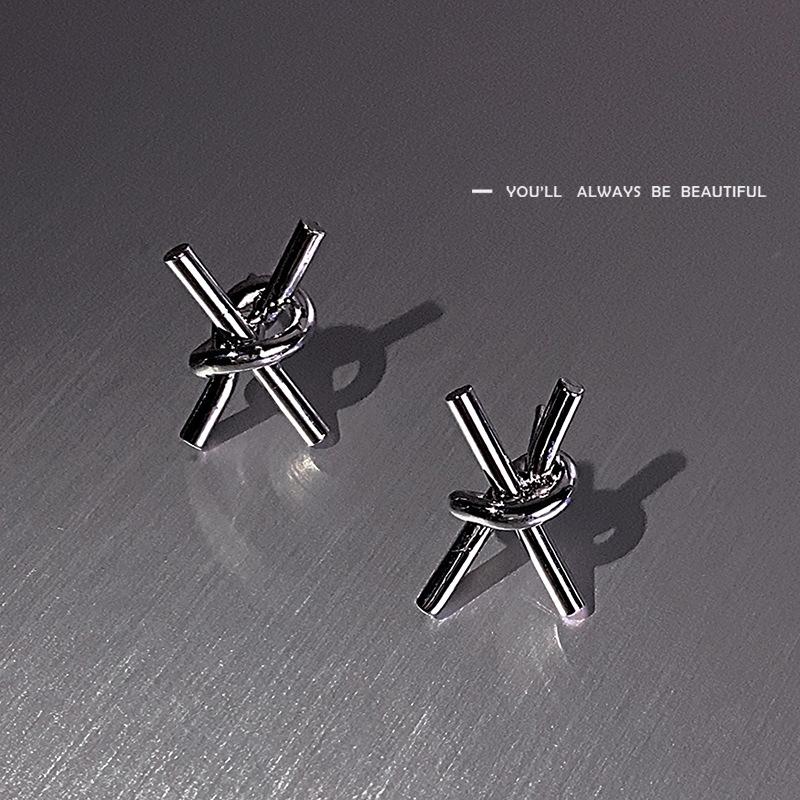 

Simple and cold wind knotted stud earrings Women s niche design sense Personalized earrings New trendy ear jewelry