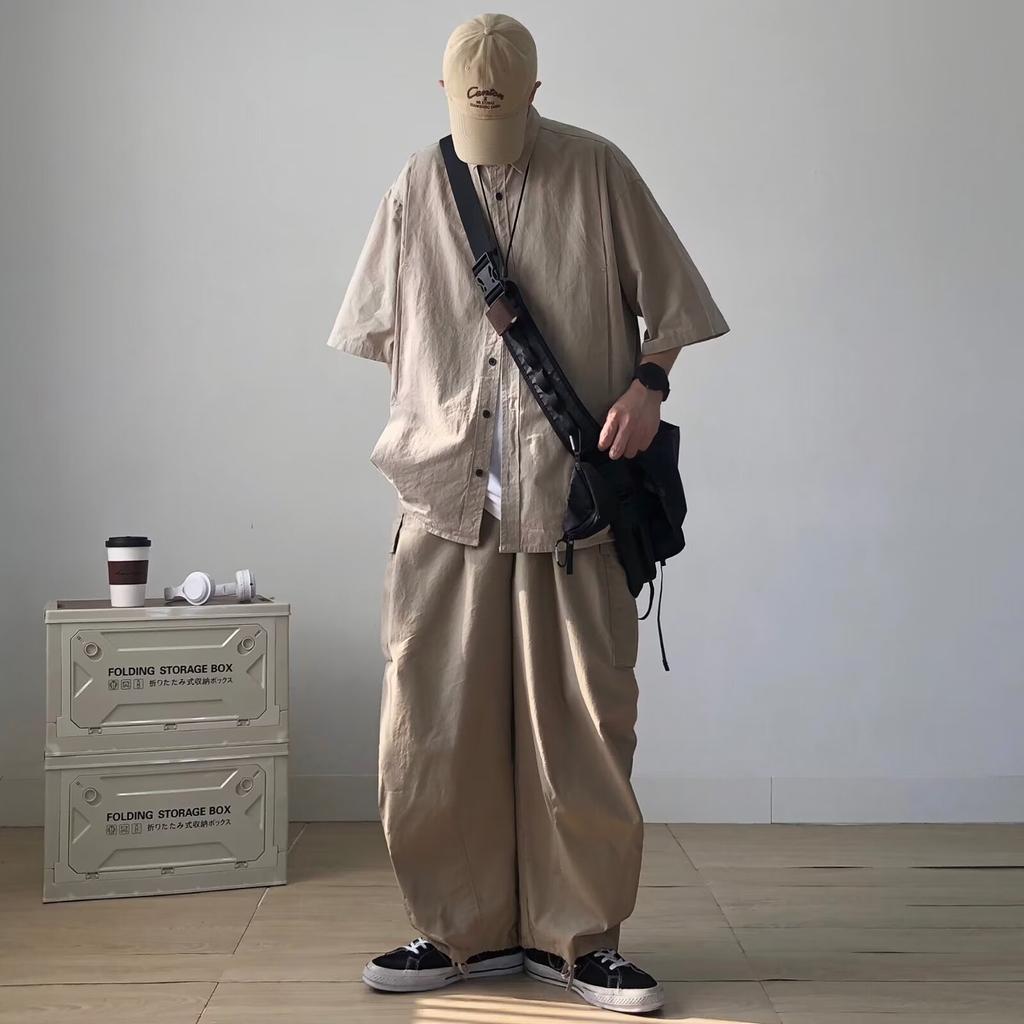 Retro kortärmad skjorta i Hong Kong-stil herr sommar japansk lös arbetskläder vardaglig femkvartsärmad toppjacka