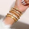Europe and the United States Hot Stainless Steel Four-leaf Clover Lucky Bracelet Fashion Women's Nail Bracelet Gold Bangles