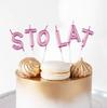 Birthday Candles with the Inscription Happy Birthday Rose Gold