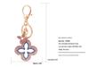 Exquisite Four-Leaf Clover Alloy Keychain Charm - Perfect Gift for Girlfriend, Bag Accent, or Keyring Accessory.