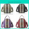 Traditional Style Embroidered Canvas Shell Bag With Multiple Compartments For Casual Wear