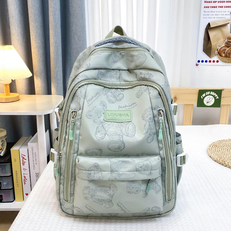 School bag for female junior high school students, simple and versatile printed bear niche design, college student computer backpack tide