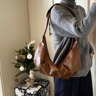 Koreanischer Ins Retro-Falten-Knödelbeutel aus weichem Leder mit großem Fassungsvermögen, lässiger vielseitiger Horn-Schulter-Umhängetasche im Lazy-Stil