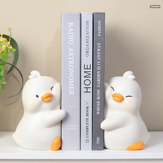 1 წყვილი Hug Duck Book End Cartoon მოცურების საწინააღმდეგო Heavy Duty Resin Craft Home Office Desktop Book Stopper Holder ცხოველთა ორნამენტი ფიგურა ფიგურა ქანდაკება