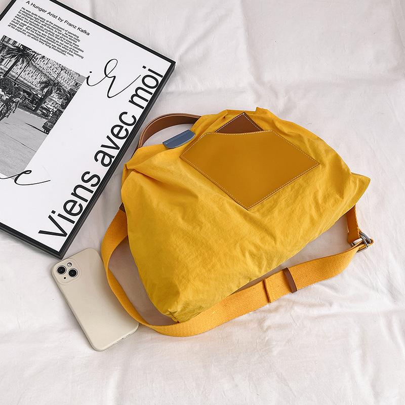 ins niche design splicing canvas bag Korean version women's shoulder bag commuter tote bag versatile casual messenger bag