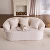 Arched double sofa with clown hat design inspiration, made of corduroy fabric. Cushions and pet mat are included and provide a warm, cozy atmosphere.