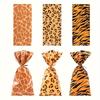 50 Pack Animal Print Gift Bags with Twist Ties - Giraffe, Leopard, Tiger Pattern Polypropylene Candy Bags for Party Favo