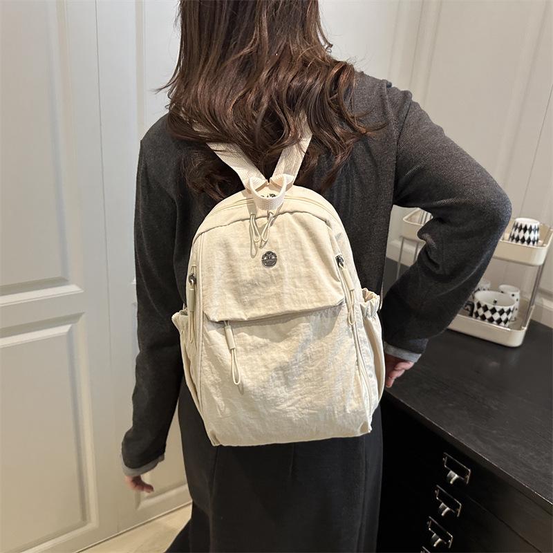 Schoolbag1011 new backpack women's fashion lightweight large-capacity schoolbag Korean version of Oxford cloth versatile women's travel backpack