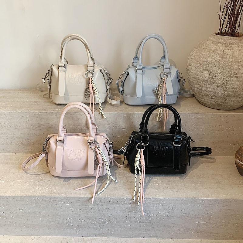 Han simple casual portable women's bag 2026 early spring new fashion commuting solid color versatile shoulder messenger bag bag