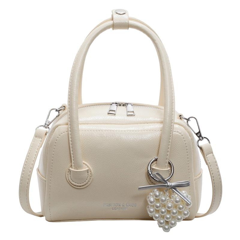 Summer new fashion simple style Korean version sweet portable pillow bag high sense versatile commuter messenger women's bag