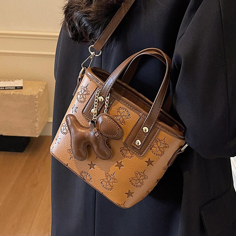 Hot-selling Korean Version of High-end Embossed Fashion Portable Bucket Bag Casual Versatile Commuter Temperament Messenger Bag Woman