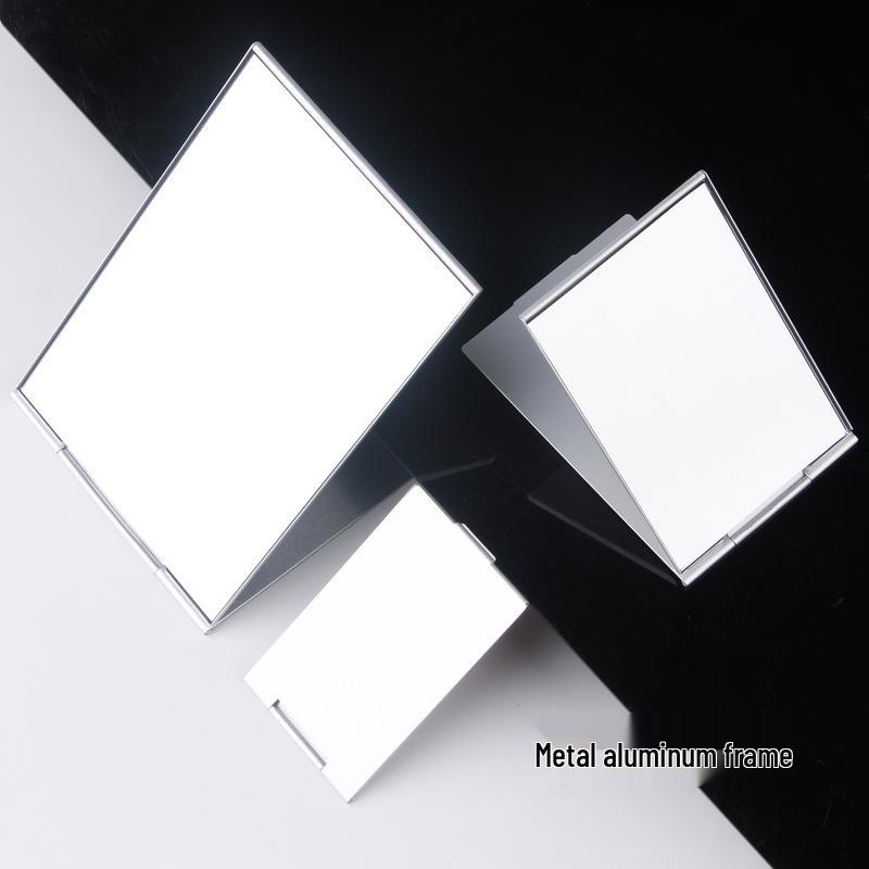 

Ultra-Thin Aluminum Desktop Makeup Mirror - Compact Folding Design 5x8.5cm