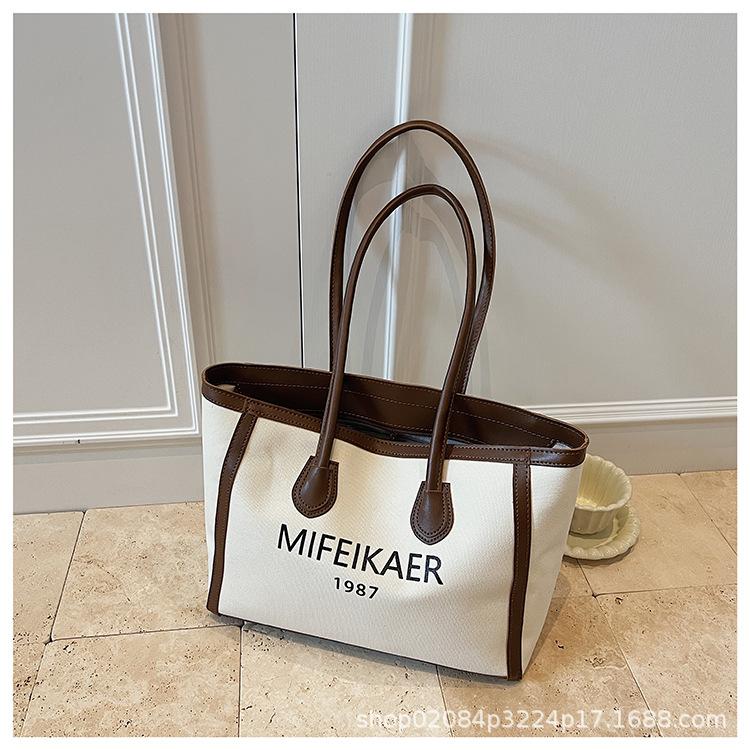 

2025 New Large Capacity Canvas Bag Versatile Commuter Tote Bag Premium Sense Simple Fashion Shoulder Bag Tote Bag темно-коричневого