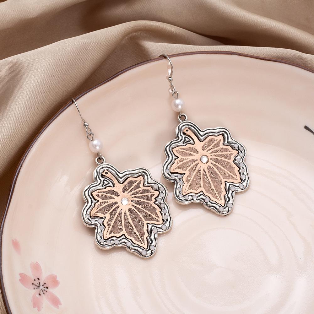 

Retro Two-Tone Leaf Earrings with Electroplated Computer Chip Design