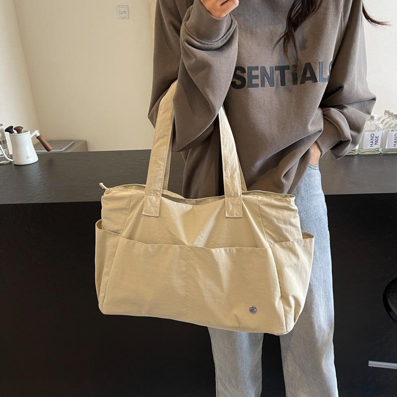 Casual and versatile large-capacity shoulder bag cross-border new solid color simple handbag commuter yoga sports storage bag