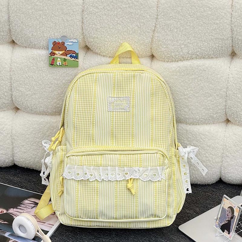 Simple casual striped schoolbag Female junior high school student backpack Large capacity class commuter travel backpack