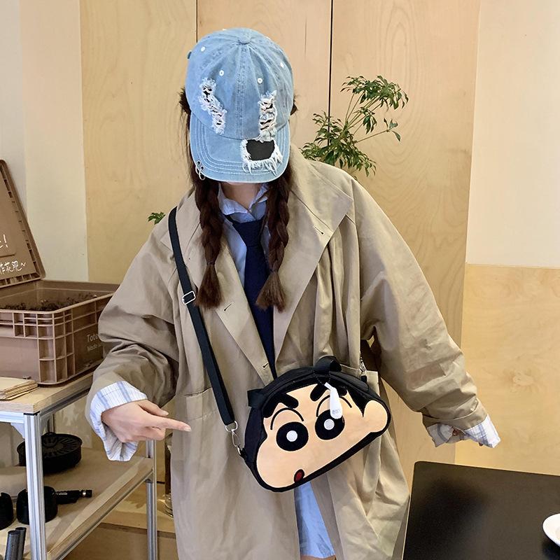 New cute cartoon small new hairball canvas diagonal span bag plush toy doll shoulder messenger bag gift wholesale