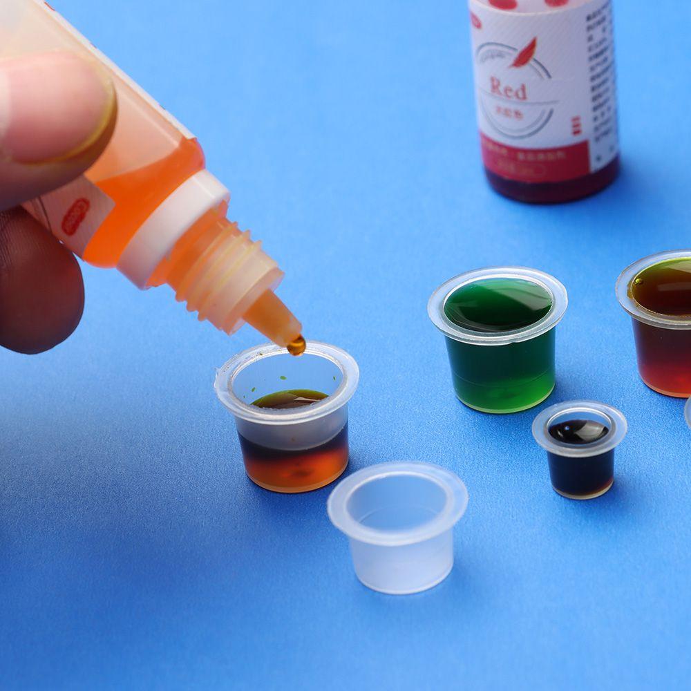 100 sztuk kubeczków na tusz do tatuażu Jednorazowe plastikowe kubeczki Kubeczki na pigmenty do body artu Pojemnik Stojak Akcesoria do makijażu i tatuażu L/M/S