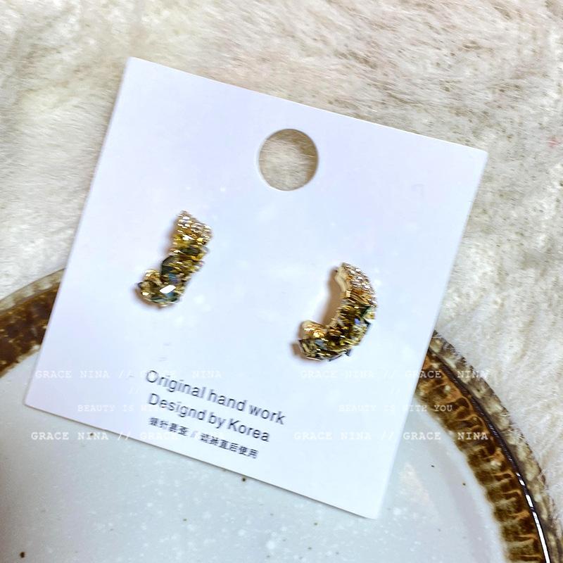 

Niche design winding flash diamond earrings women s light luxury high-end earrings personalized fashion stud earrings new trendy