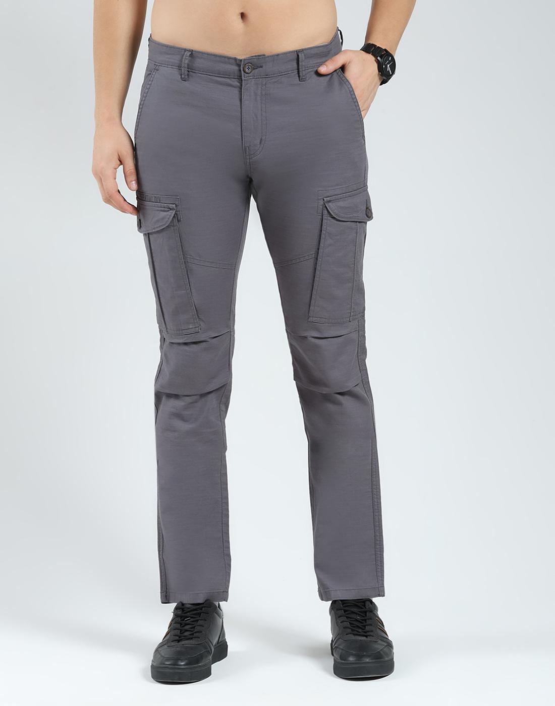 

Мужские брюки карго прилегающего силуэта | Однотонные повседневные брюки | Застежка на пуговицы | Стильные и удобные повседневные карго для мужчин 36 серый