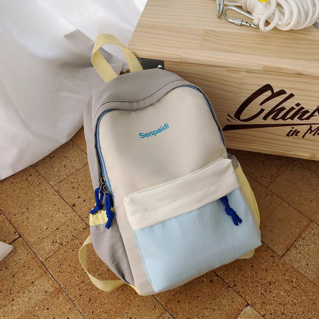 Schoolbag1011 new contrasting color splicing backpack, male and female students small schoolbag, outdoor travel high value leisure backpack