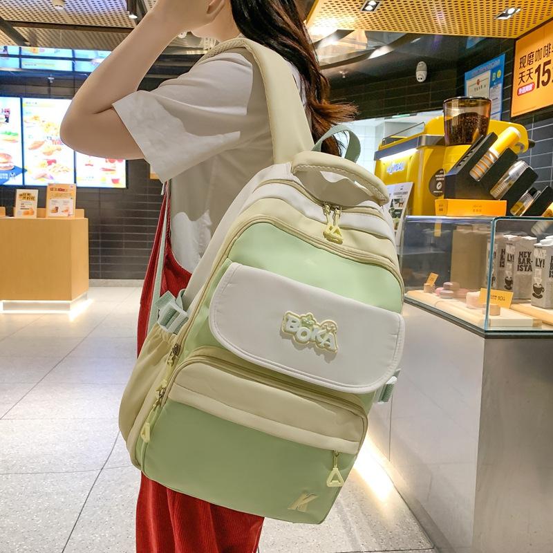 College style contrasting colors ins student schoolbag female Korean version lightweight junior high school student large-capacity backpack